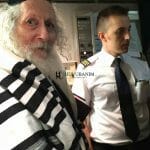 הרב ברלנד שליט"א במטוס בדרך לאומן תשע"ח